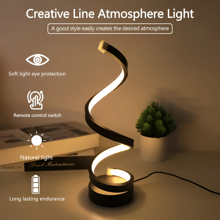 Elegant svart bordslampa med dimbar LED och justerbar färgtemperatur, utmärkande spiraldesign.