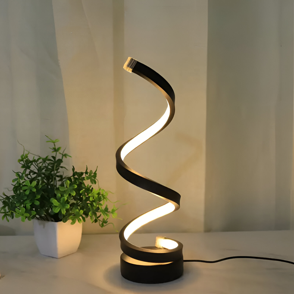 Justerbar svart bordslampa med energisnål LED-teknik och modern spiraldesign, idealisk som skrivbordslampa.