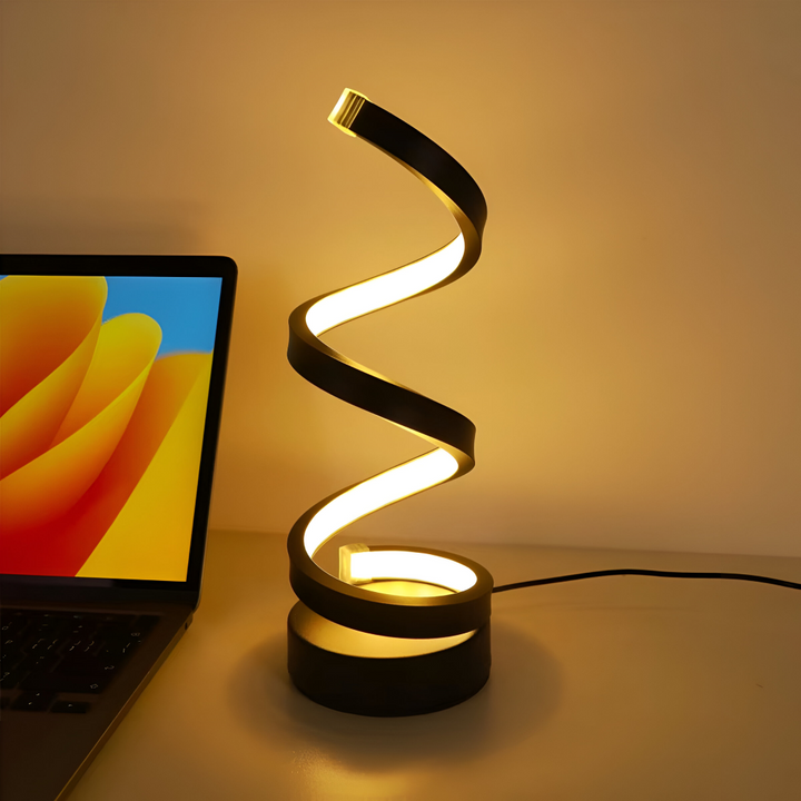 Stilren svart bordslampa med modern spiraldesign, justerbar ljusstyrka och färg, USB-driven för flexibilitet.