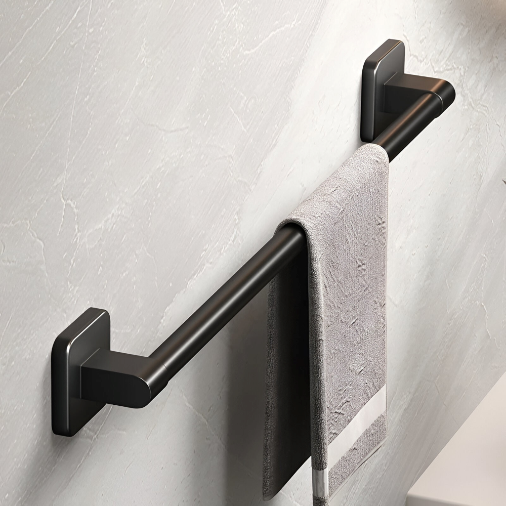 Stilren svart handdukshållare i aluminium, självhäftande för badrum. Vägghängd organisation.