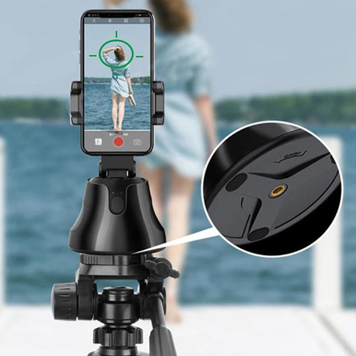 "Svart smart spårningskamera med 360° rotation, telefonfäste för smartphones, perfekt för videografi och ansiktsspårning."