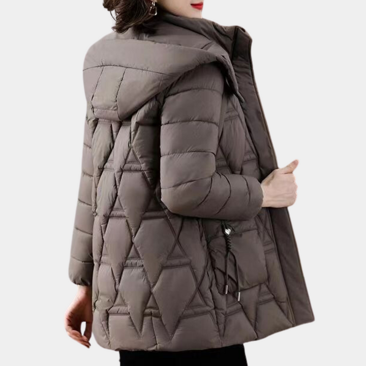 Kvinnors varmfodrade pufferjacka i svart, perfekt för höst & vinter. Komfortabla ytterkläder.