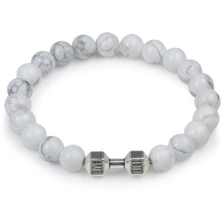 "Svart unisex hantelarmband i onyx och lavasten för chakra, elegant design, naturliga stenar, accessoar för energi och stil."