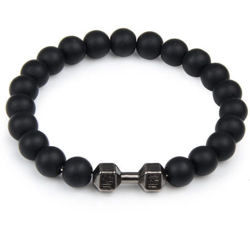 "Svart unisex hantelarmband i onyx och lavasten för chakra, elegant design, naturliga stenar, accessoar för energi och stil."