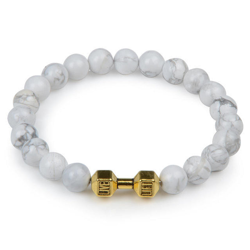 "Svart unisex hantelarmband i onyx och lavasten för chakra, elegant design, naturliga stenar, accessoar för energi och stil."