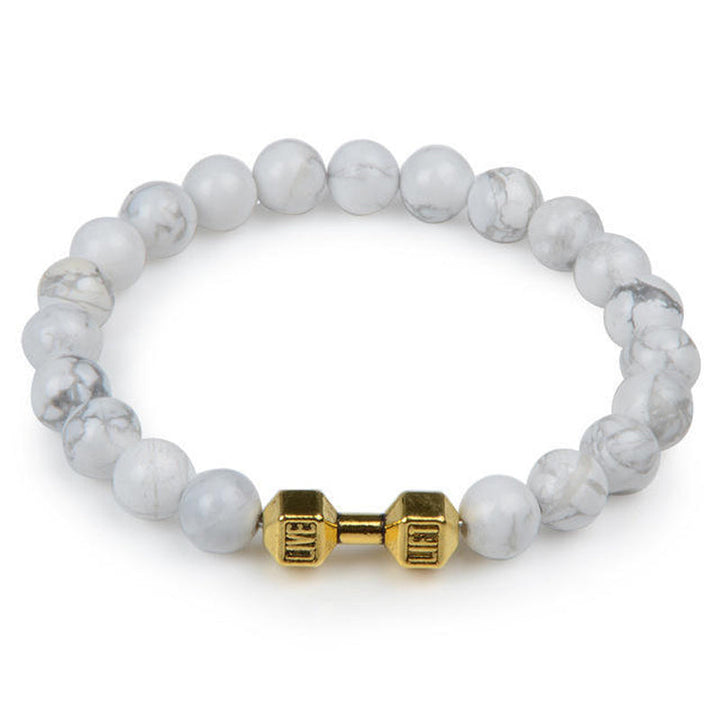 "Svart unisex hantelarmband i onyx och lavasten för chakra, elegant design, naturliga stenar, accessoar för energi och stil."