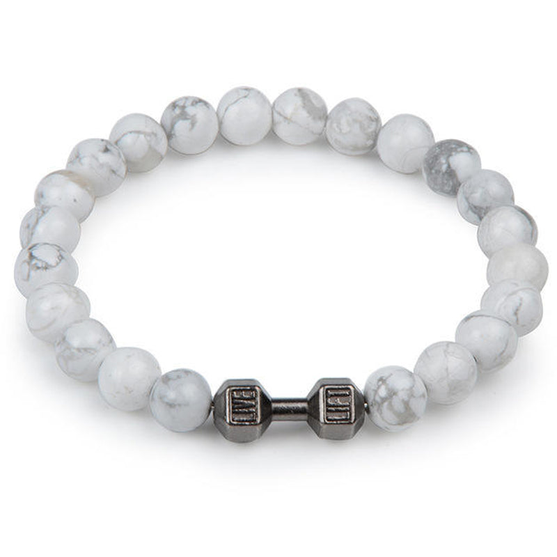 "Svart unisex hantelarmband i onyx och lavasten för chakra, elegant design, naturliga stenar, accessoar för energi och stil."