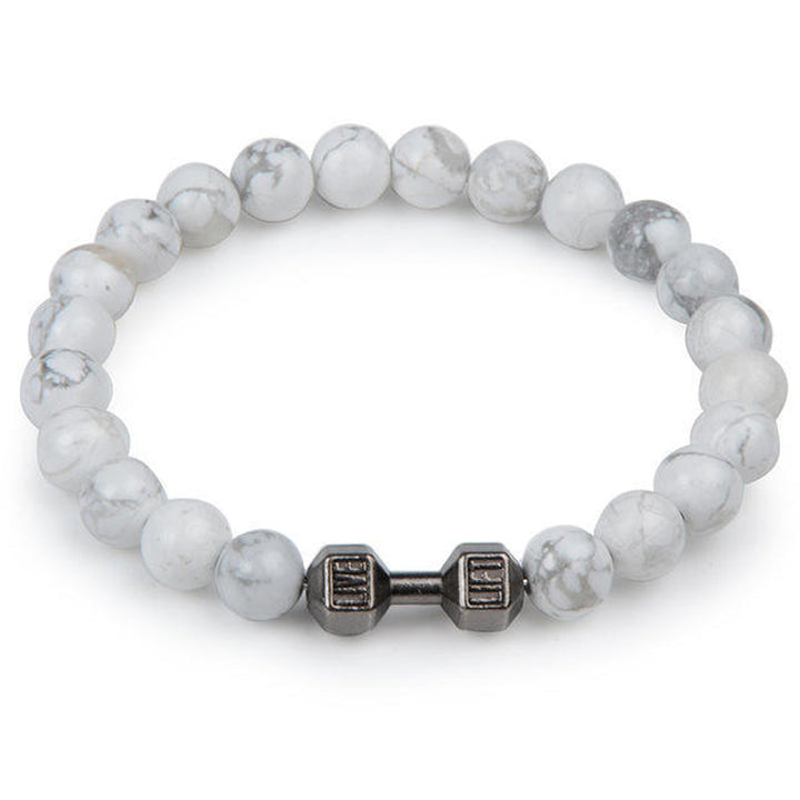 "Svart unisex hantelarmband i onyx och lavasten för chakra, elegant design, naturliga stenar, accessoar för energi och stil."