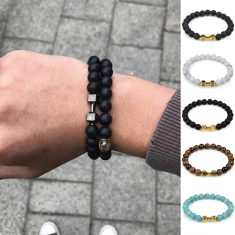 "Svart unisex hantelarmband i onyx och lavasten för chakra, elegant design, naturliga stenar, accessoar för energi och stil."