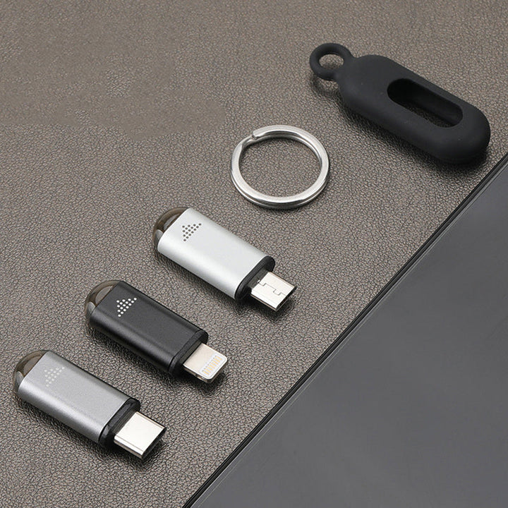 "Svart universal telefon-fjärrkontroll i PVC och aluminium för smartphones, kompatibel med Android och iOS."