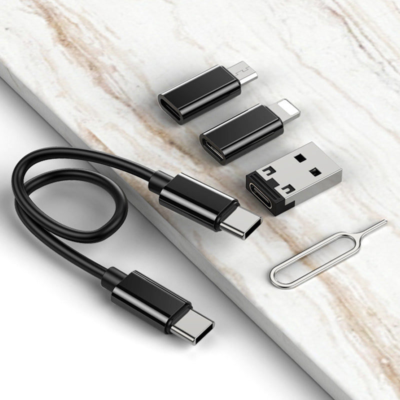 "Svart USB-laddningskabelbox, multifunktionell med olika adaptrar och plats för sim- och minneskort för elektronik."