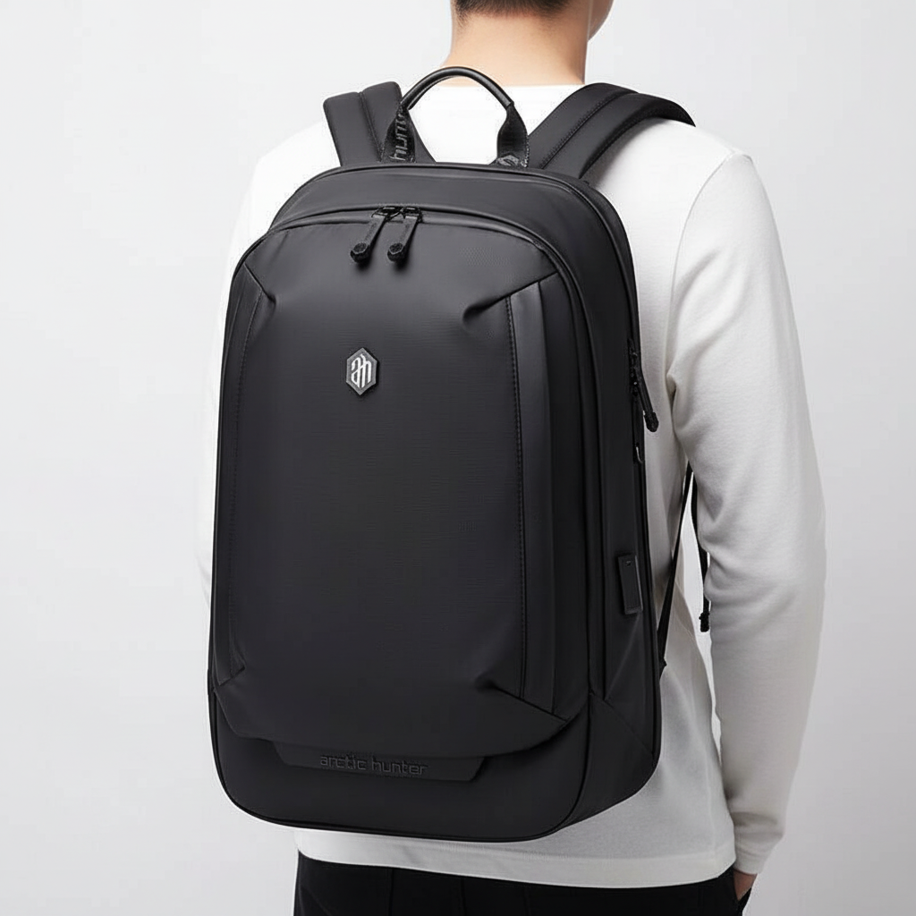 Mäns stöldskyddsryggsäck med laptopfack, vattentålig för jobb, skola och outdoor-äventyr. Svart, säker design.