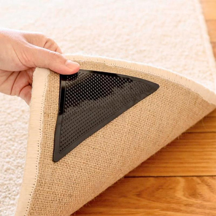 "Svarta anti-slip gummimattgreppare, hållbara och tvättbara, säkrar mattor mot halkning, lugnt och säkert hem."