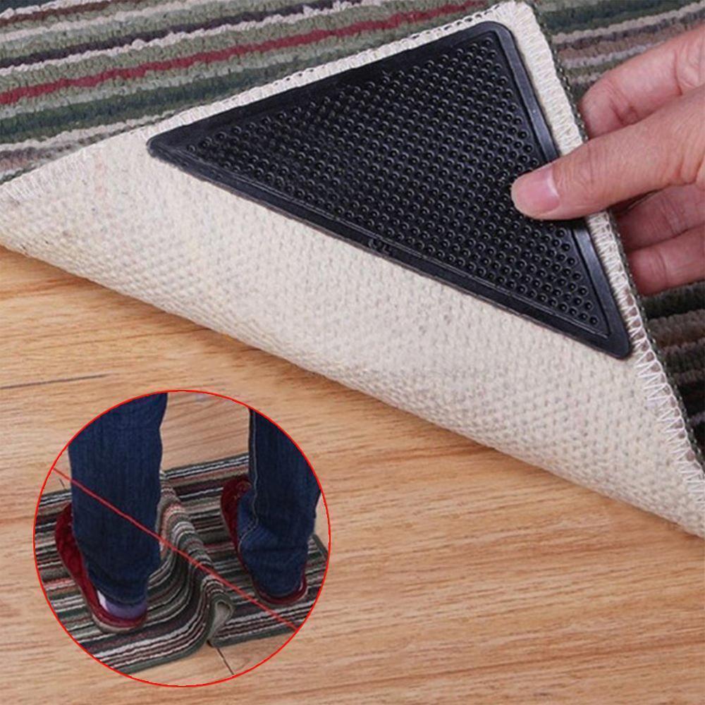 "Svarta anti-slip gummimattgreppare, hållbara och tvättbara, säkrar mattor mot halkning, lugnt och säkert hem."