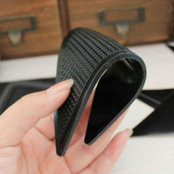 "Svarta anti-slip gummimattgreppare, hållbara och tvättbara, säkrar mattor mot halkning, lugnt och säkert hem."