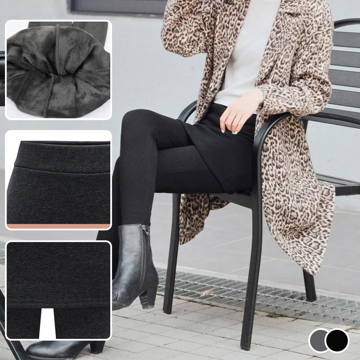 "Svarta fleecefodrade damkjolleggings, elegant och varm design, perfekt för vinterdagar, stilren matchning med stövlar."