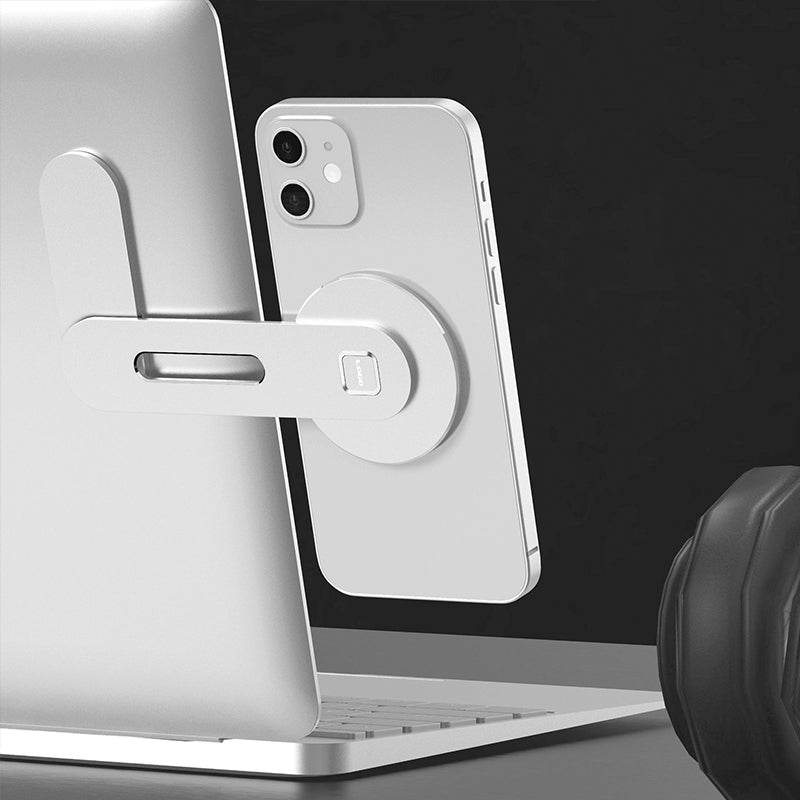 "Svart/silver magnetisk telefonhållare i aluminium monterad på datorskärm, passar smartphones och iPad mini."