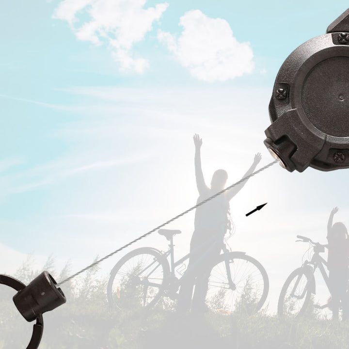 "Svart/vit multifunktionell nyckelring med infällbar vajer, hållbar aluminiumkarbin för utomhusbruk, ca 12,5 cm lång."