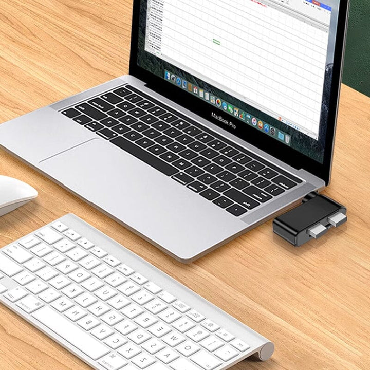 "Svartvit roterbar USB-hubb med 4 portar, idealisk för dator och surfplatta, erbjuder smidig anslutning och 180 graders rotat