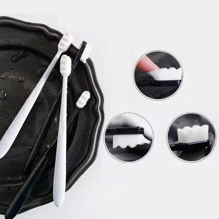 "Tandborste med 10 000 mjuka borsthår, minimal design och halkfritt ergonomiskt handtag för skonsam rengöring."