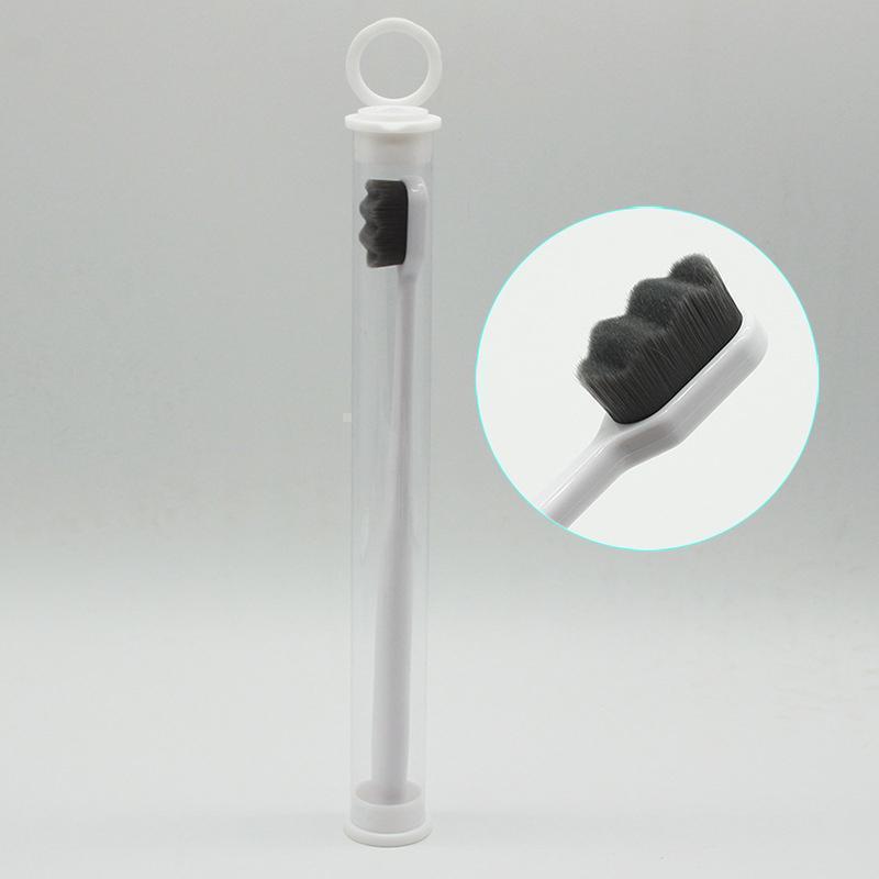 "Tandborste med 10 000 mjuka borsthår, minimal design och halkfritt ergonomiskt handtag för skonsam rengöring."