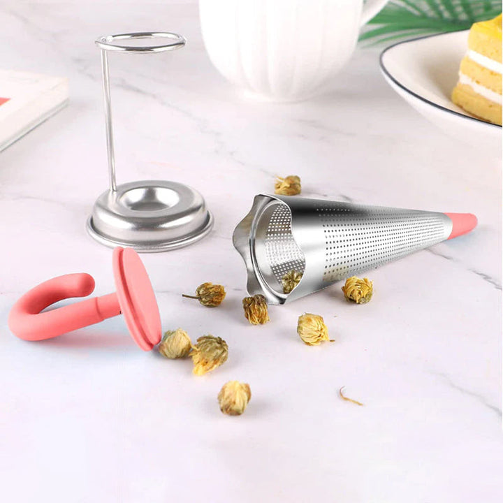 Teinfuser i paraplyform av rostfritt stål med lekfull design, i grönt, rött, grått eller blått, perfekt för tebryggning.
