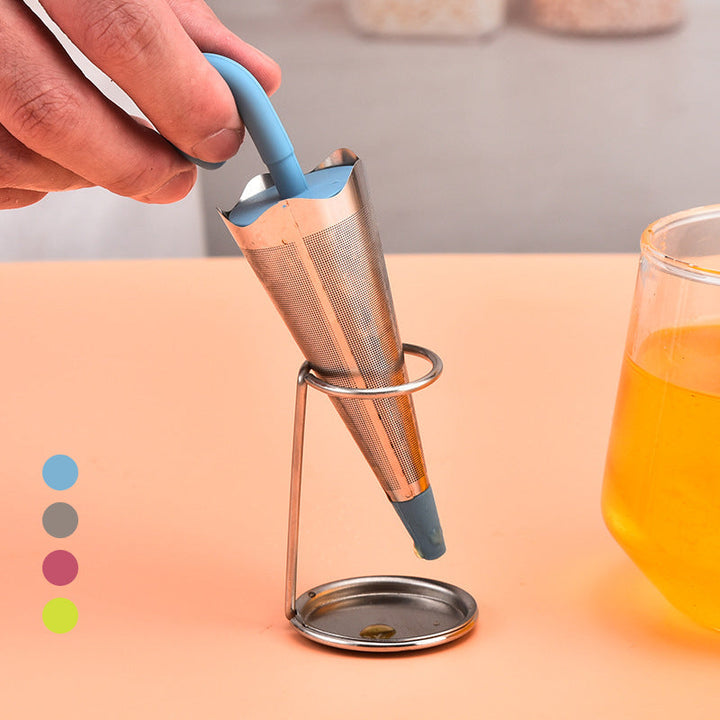 Teinfuser i paraplyform av rostfritt stål med lekfull design, i grönt, rött, grått eller blått, perfekt för tebryggning.