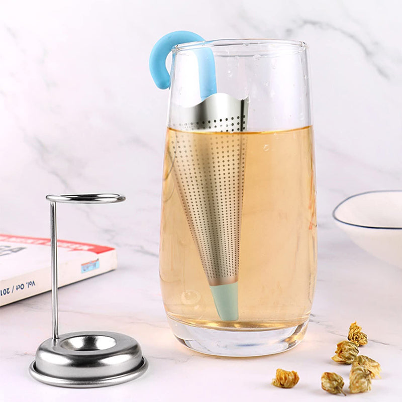 Teinfuser i paraplyform av rostfritt stål med lekfull design, i grönt, rött, grått eller blått, perfekt för tebryggning.