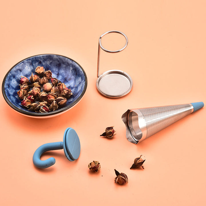 Teinfuser i paraplyform av rostfritt stål med lekfull design, i grönt, rött, grått eller blått, perfekt för tebryggning.
