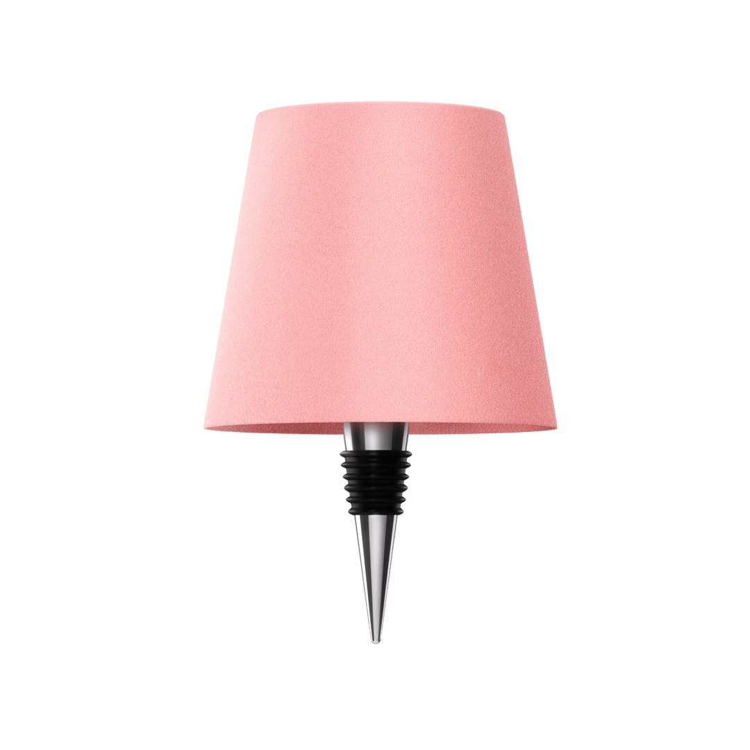 Trådlös LED flasklampa intill en växt, vacker inredningsdetalj som dekoration och mysbelysning.
