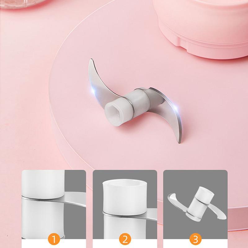 Trådlös bärbar elektrisk matberedare i elegant design för snabb matberedning i modernt kök. Kompakt och USB-uppladdad.