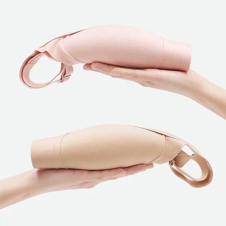 "Trådlös dam-BH i beige med sidostöd och fast stoppning för ökat stöd, smidig design för en slät silhuett."