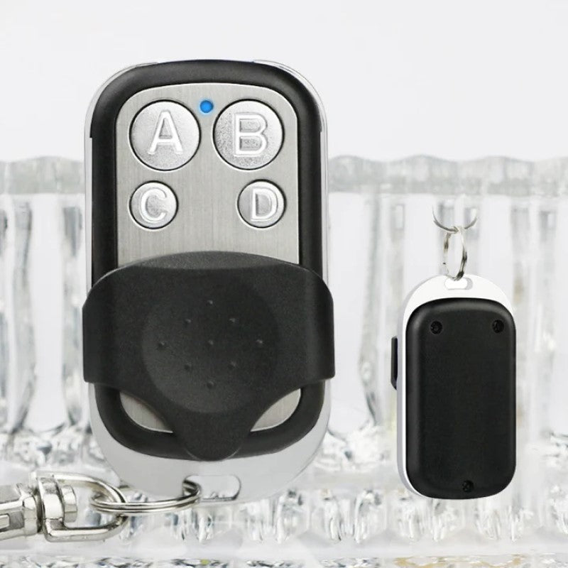"Trådlös fjärrkontrollduplikator 315/433 MHz med 4 knappar, kompakt design och nyckelring, svart färg, hemautomationstillbehö