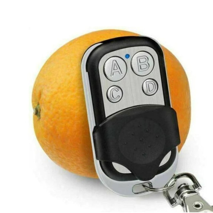 "Trådlös fjärrkontrollduplikator 315/433 MHz med 4 knappar, kompakt design och nyckelring, svart färg, hemautomationstillbehö