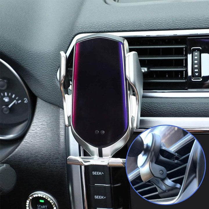 Trådlös Qi-billaddare med robotarm i silver, flexibel justering och 360° rotation för optimal mobilanvändning i bilen.