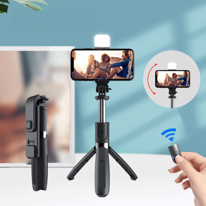 "Trådlös selfiepinne med LED-belysning och bluetooth i svart, förlängningsbar design i aluminium för iPhone och Android."