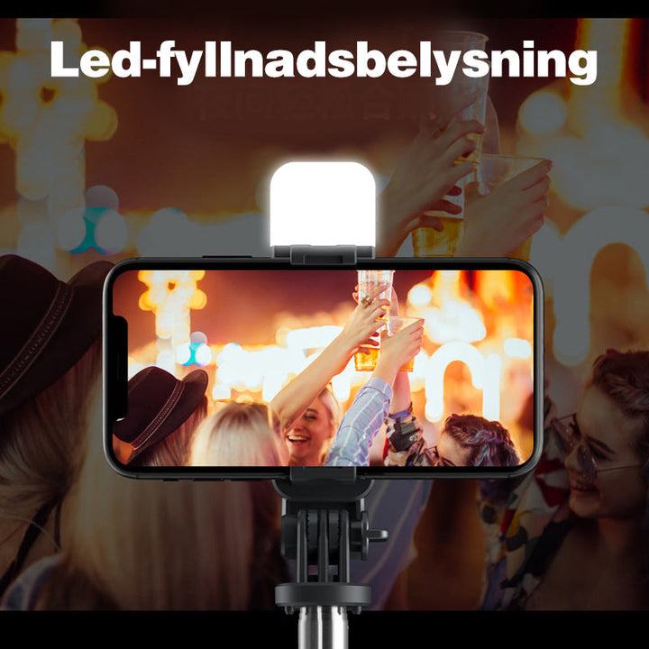 "Trådlös selfiepinne med LED-belysning och bluetooth i svart, förlängningsbar design i aluminium för iPhone och Android."