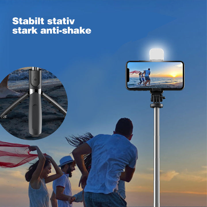 "Trådlös selfiepinne med LED-belysning och bluetooth i svart, förlängningsbar design i aluminium för iPhone och Android."