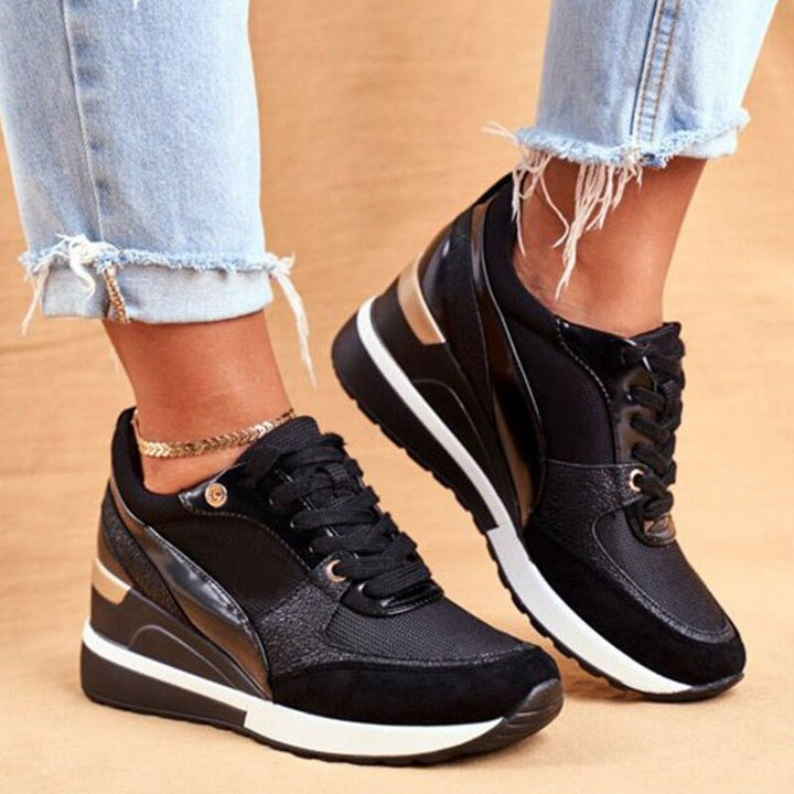 Fritidsskor: gula damsneakers med sportig design, halkfri sula och trendig färgkombination.