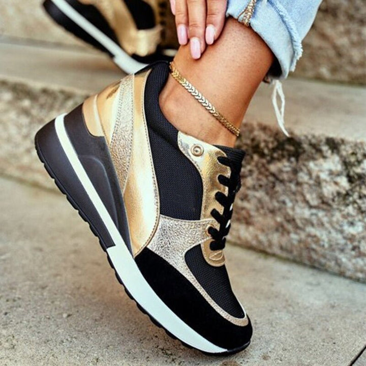Moderna gula damsneakers med svart accent, perfekta för en aktiv fritid och optimal komfort.