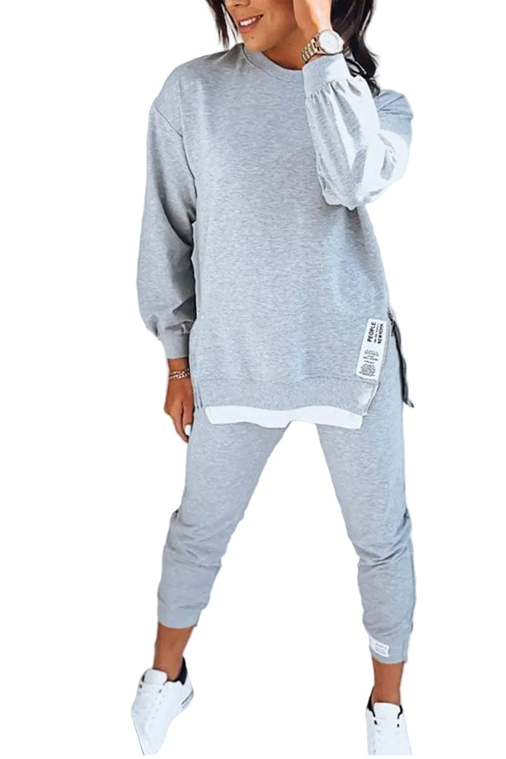 Trendigt damset med mjuk sweatshirt och matchande byxor för avslappnad komfort.