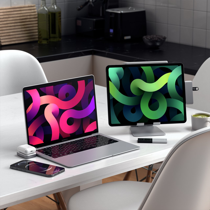 "Type-C Mobil Pro Hub, slimmad grå elektronikadapter med USB-C, HDMI, USB 3.0 portar, bärbar och kompakt design."