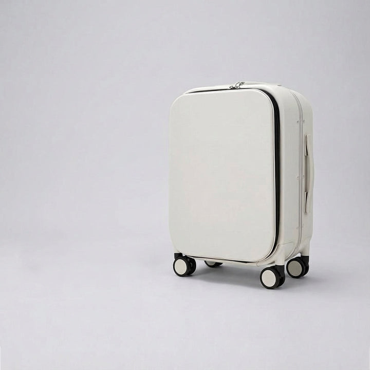 Kompakt och tystgående Navisphere spinner bagage i aluminium, idealisk för korta resor med god organisation.