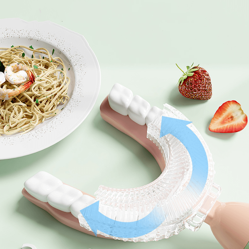 "U-formad manuell tandborste för barn i färgglad design med 360° rengöring, tillverkad i säker silikon för god munhygien."