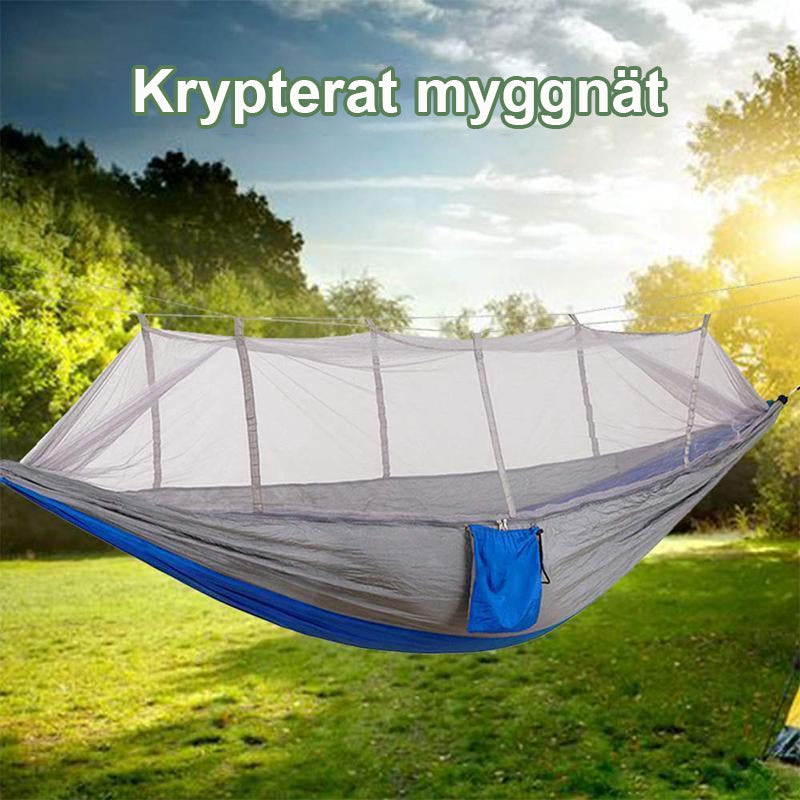 "Ultralätt myggnäthängmatta, grön nylon, perfekt för camping och utomhusaktiviteter, med inbyggt insektsskydd."