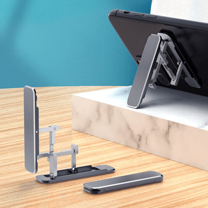 Ultratunn justerbar telefonstativ i aluminium, minimalistisk design, bärbar och vikbar för handsfree-koll på mobilen.