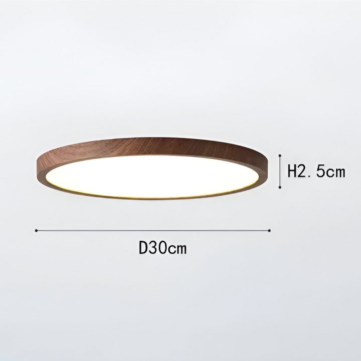 Elegant rund LED taklampa i valnötsträ, dess ultratunna form smälter in perfekt.