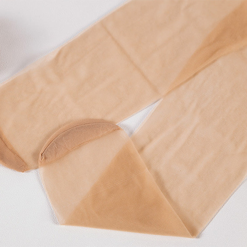 "Ultratunna svarta spetsstrumpor i bomull, elegant och funktionell design, perfekta för vinterbruk med silkeslen finish."