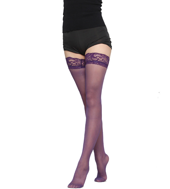 "Ultratunna svarta spetsstrumpor i bomull, elegant och funktionell design, perfekta för vinterbruk med silkeslen finish."