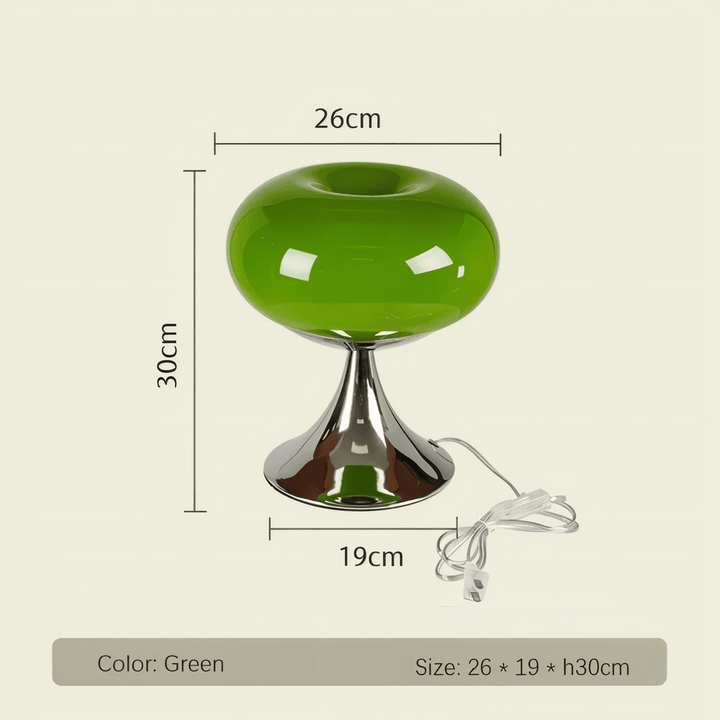 Elegant glasbordslampa, rundad form med varm LED-belysning. En stilren detalj för modern inredning.